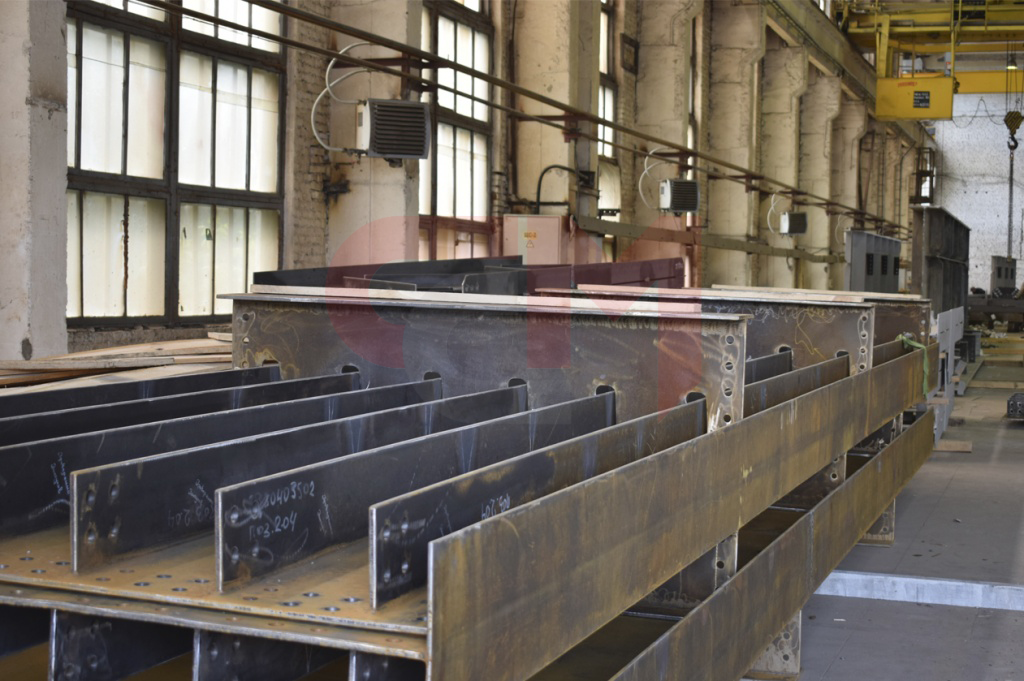 Завод по производству стальных металлоконструкций (ЗМК) (Для промышленных зданий, мостов)